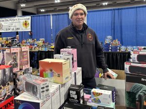 Syracuse firefighter with gifts