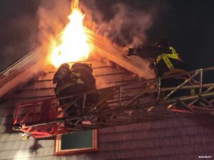 Boston firefighters operate at a single-family home in Paine st. In Roslindale